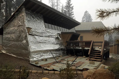 Cabin wrapped in foil one of few homes to survive California wildfire | New York Post