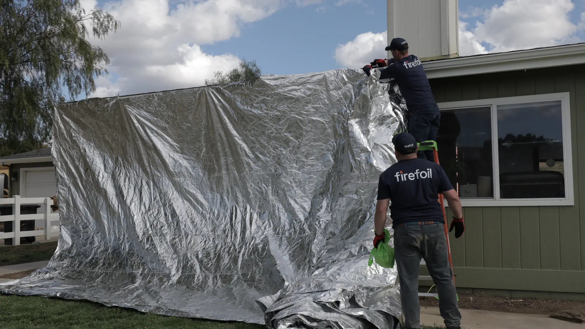 FireFoil team installing shields on residential home